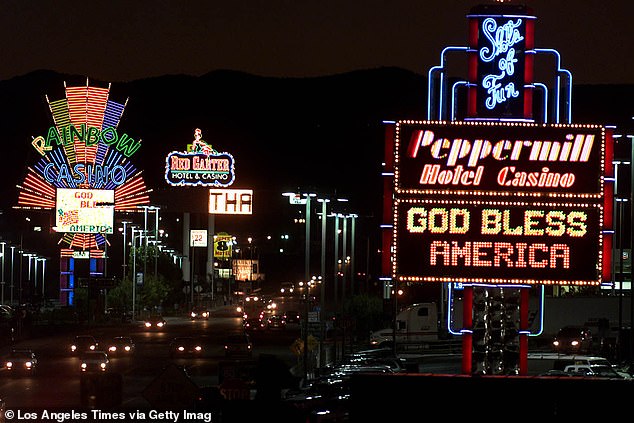 Just off Highway 80 near the Utah border, the Peppermill Hotel Casino proudly lit its neon sign with a patriotic message in a file photo.