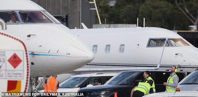 A convoy of vehicles was seen waiting alongside the private jet to escort Travis and his entourage to their accommodation.