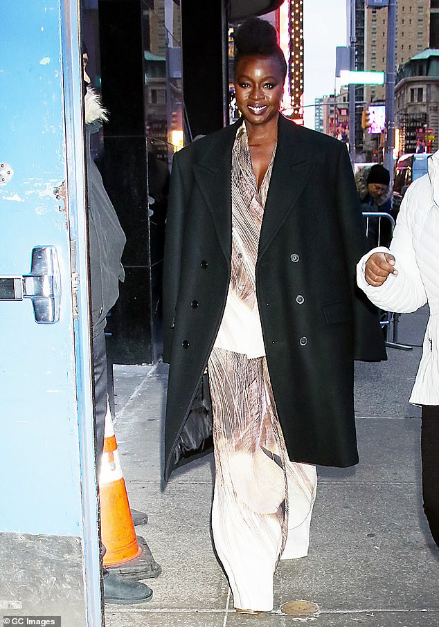 Danai dressed in dangling earrings and rings also wore a large black coat as she arrived at the studio.