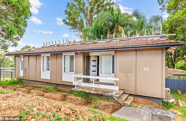 That's below the median house price across all Australian capital cities. But there are possibilities if they were to buy a dilapidated house near Mount Druitt in Sydney's outer west (pictured is a house on the market in Bidwill with an auction price guide of $600,000).