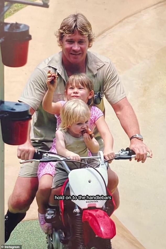 Robert also added this photo of himself sharing a bike ride with his older sister Bindi.