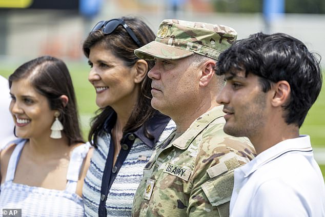 Nikki Haley and her husband Michael (center) have two children: Rena (left) and Nalin (right)