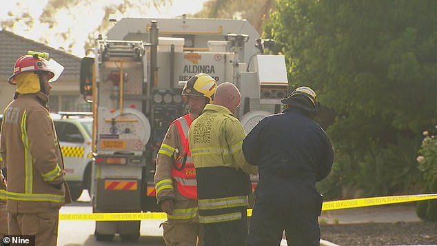 Emergency services workers at the scene of the fire at Aldinga Beach, Adelaide.