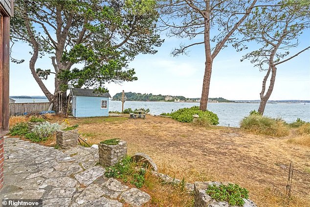 The house has its own 35 meter wide water frontage, with distant views of the water.