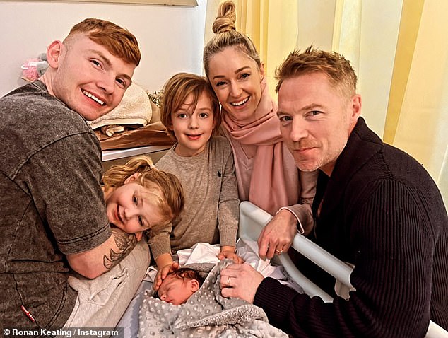 Ronan took to Instagram to share a photo of Jack holding Maya Ann in his arms while with Ronan and his wife Storm, with another from a year earlier (pictured).