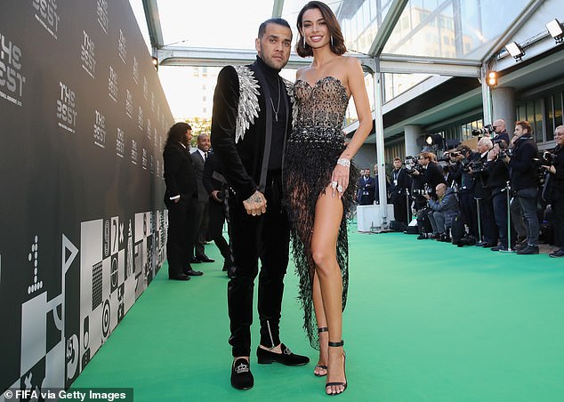 Alves and San pose for photographs during The Best FIFA Football Awards 2018