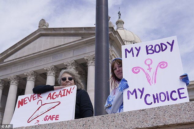 Activists are shown above outside the Oklahoma state legislature. State legislators urged not to ban abortion