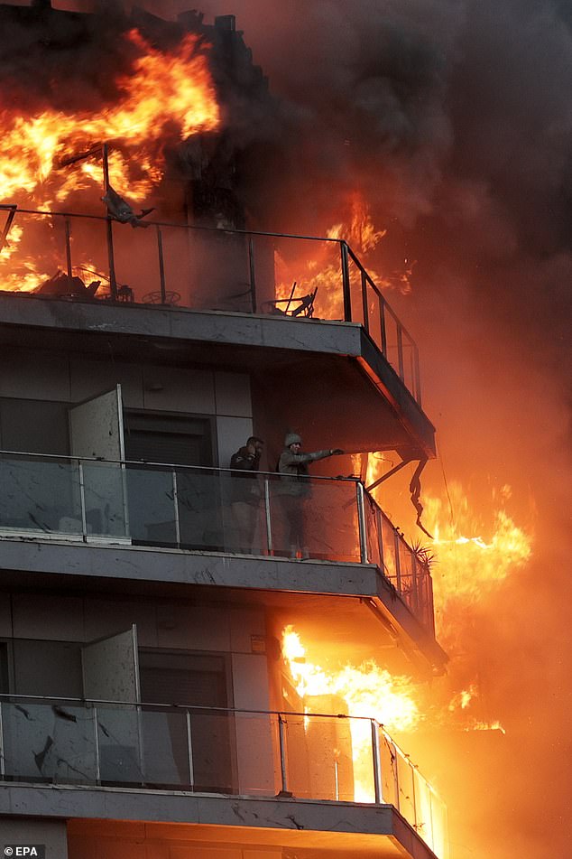 The neighbors were trapped on their balconies - a few meters from the flames - while they waited for firefighters to rescue them from the inferno.