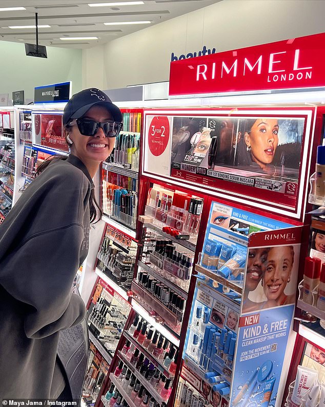 The TV presenter also posed delightedly next to her Rimmel campaign, which she saw at the airport after returning from South Africa.