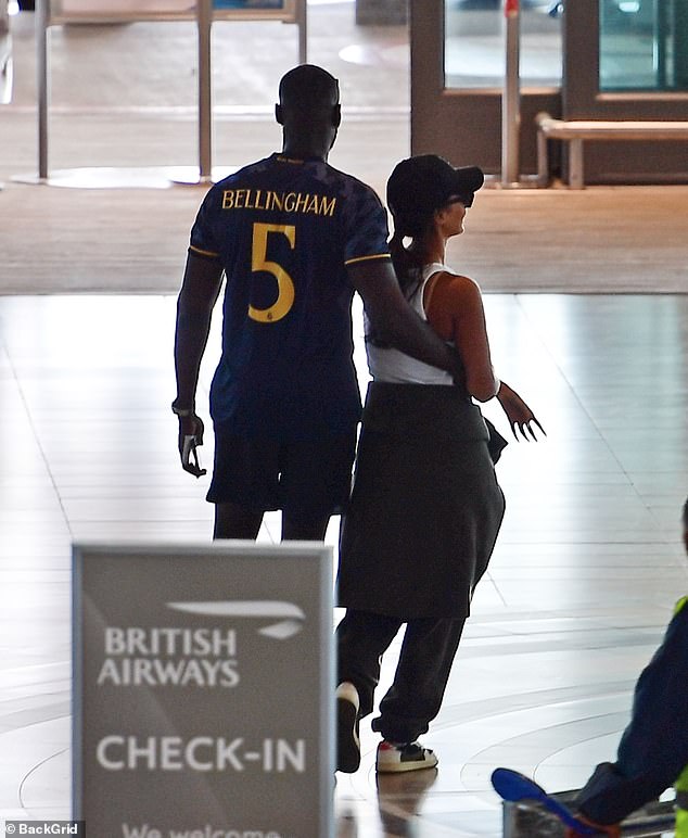 Stormzy was seen putting his arm around Maya's waist as they strolled through the airport.