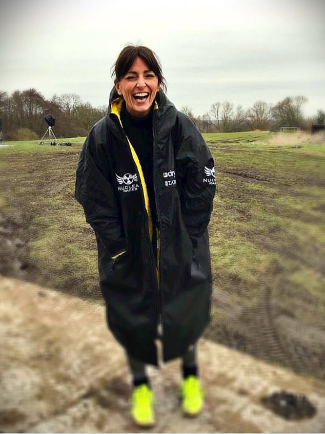 Davina McCall pictured in a special edition dry robe - but she doesn't look like she's about to go swimming