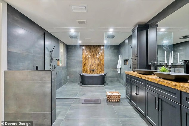 One of the key features is a huge bathroom with a huge double shower and cabinet area.