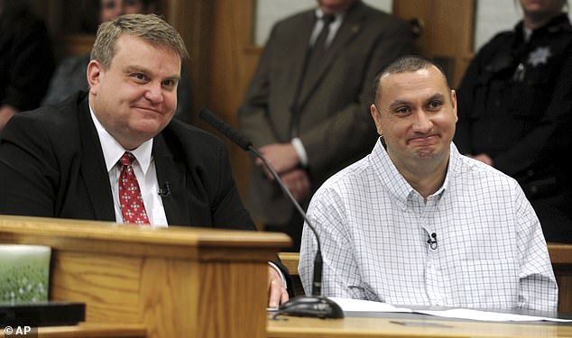 Christopher Tapp, pictured right with his public defender John Thomas during Tapp's post-conviction relief hearing at the Bonneville Courthouse in Idaho Falls on March 22, 2017.