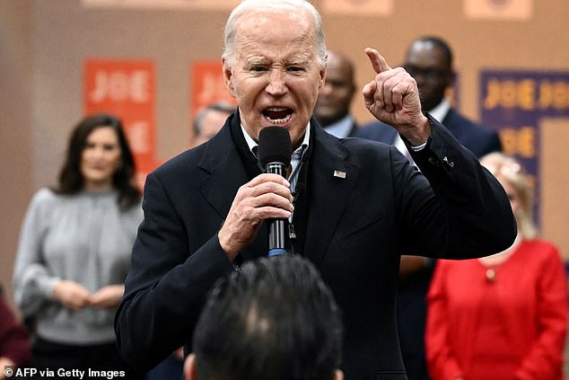 Joe Biden speaks during a visit to a United Auto Workers (UAW) phone bank in metro Detroit, Michigan, on February 1, 2024.