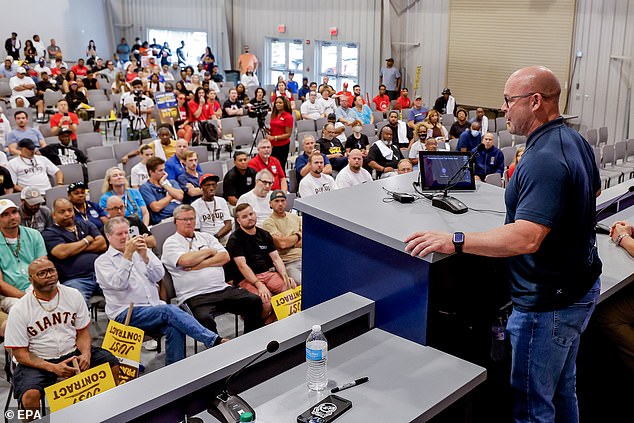 Sean O'Brien, general president of the International Brotherhood of Teamsters, speaks with union members during a rally in Atlanta in July 2023.