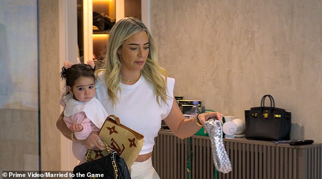 Ward can be seen holding her daughter as she packs her bags to move to Saudi Arabia.