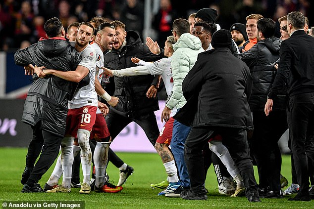 Players and staff clashed on the pitch after Sparta Prague beat the Turkish giants.