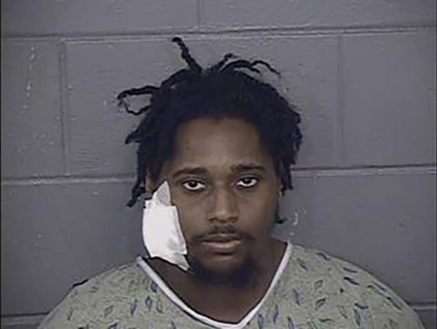A second man, Lyndell Mays, 23, has also been charged with murder. He appears in a mugshot from a previous arrest for displaying a gun during an argument over a girl.