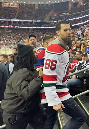 Only the Devils fan appeared to be ejected.