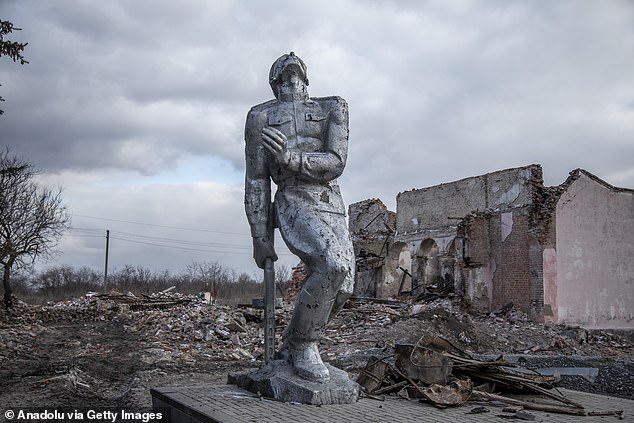 A statue of a soldier among the ruins of Avdiivka which has now been taken by Russia