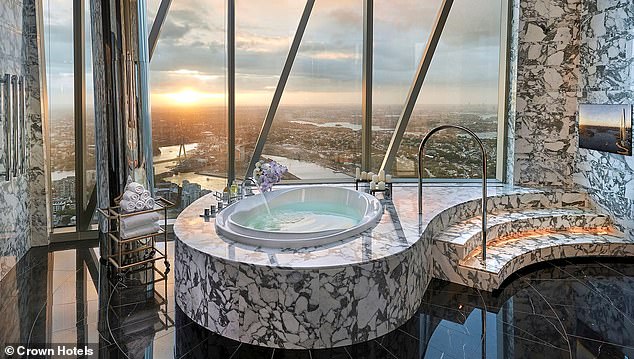 The two-story, 860-square-foot hotel room is situated on the 88th floor and offers stunning panoramic views of Sydney and Sydney Harbor through its floor-to-ceiling windows.