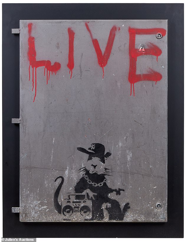 Pictured: Banksy's 'Gangsta Rat - Live' stencil painting in Liverpool, which sold for $190,500 at Julien's auction in Los Angeles.