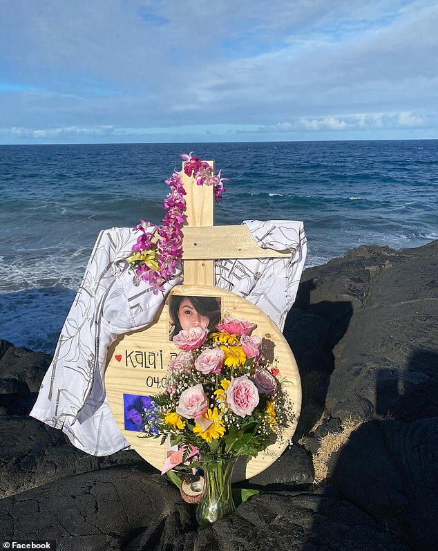 A memorial has been installed on the side of a cliff near the spot where the young mother, who tragically fell early Sunday morning, died.