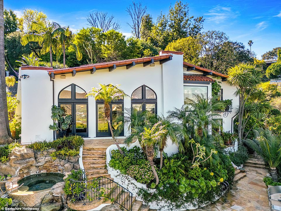 Built in the late 1960s and updated over the years, the three-bedroom, 3.5-bathroom property features a stunning lagoon-style pool and spacious outdoor patio.