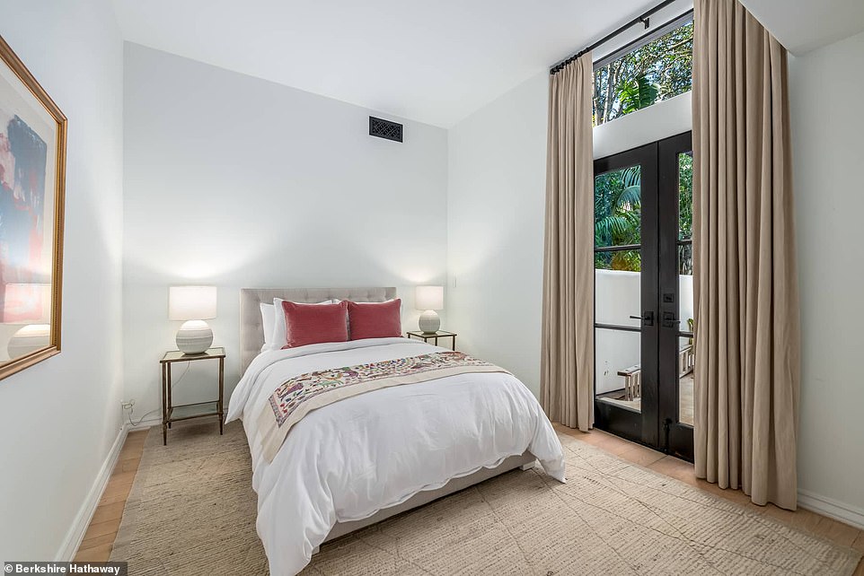 A small guest bedroom keeps visitors comfortable