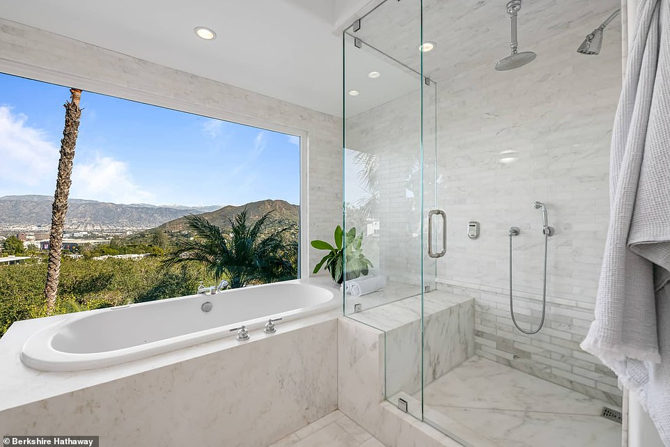 The main bathroom is covered in beautiful white marble.
