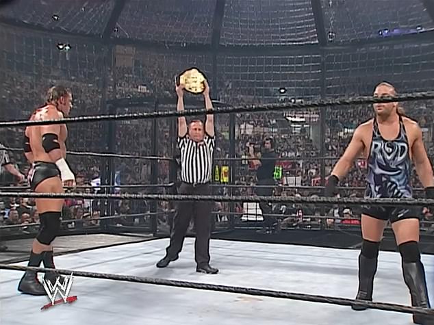 In the match, Triple H (left) defended his World Heavyweight Championship against former WWE legends Rob van Dam (right), Booker T, Chris Jericho, Kane and Shawn Michaels.
