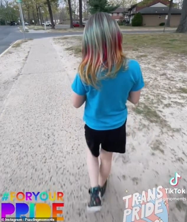 In some photos, the boy is wearing a t-shirt with the slogan 'I love my 2 moms' and appears to have dyed his hair rainbow colors.