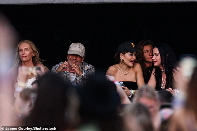 Other famous faces attending the show included Rita Ora and her husband Taika Waititi (center), Katy Perry (far right) and Toni Collette (left).