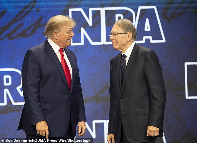 LaPierre, pictured at a 2022 NRA rally with Donald Trump, has been found responsible for diverting millions of dollars to pay for his lavish lifestyle.