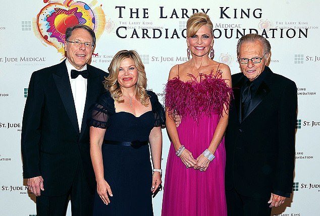 LaPierre is pictured in the 2012 photo with his wife Susan; the late Larry King and his wife Shawn