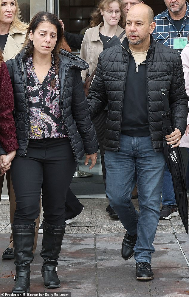 Nancy Iskander was crossing the street with the brothers and their youngest son, Zachary, 5, when they were hit. Nancy and her husband Karim leave court on February 6.