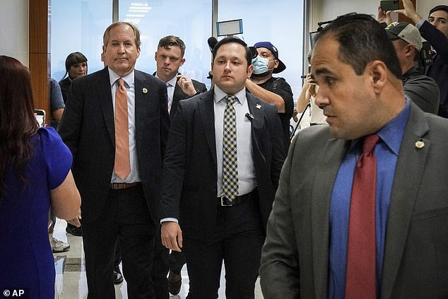 Texas Attorney General Ken Paxton, photographed Feb. 16, leaving a Houston court hearing for a felony security fraud case in which he is a defendant.
