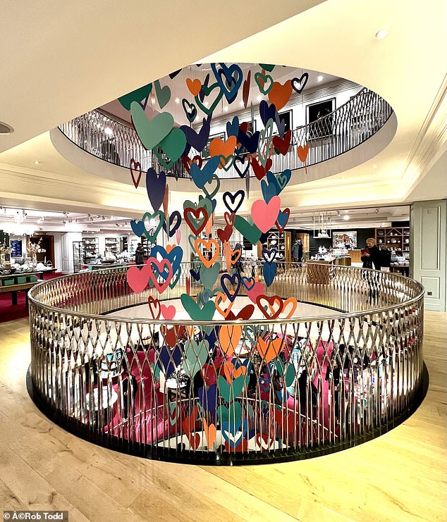 However, the 43-year-old Londoner was surprised to see Fortnum and Mason using a similar design for their Valentine's Day display (above right) in their Piccadilly store.