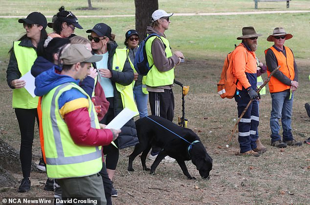 Sniffer dogs were seen in the group as participants prepared for a long day of searching.