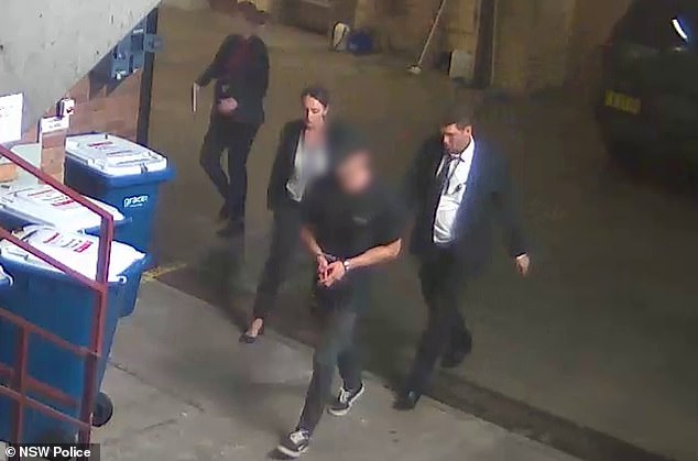 Beau Lamarre-Condon was charged after surrendering to police in Bondi following a massive manhunt (pictured, detectives take Lamarre-Condon away for questioning).