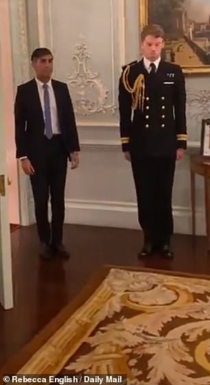 The former Royal Navy helicopter pilot pictured at Clarence House this week with Rishi SunaK