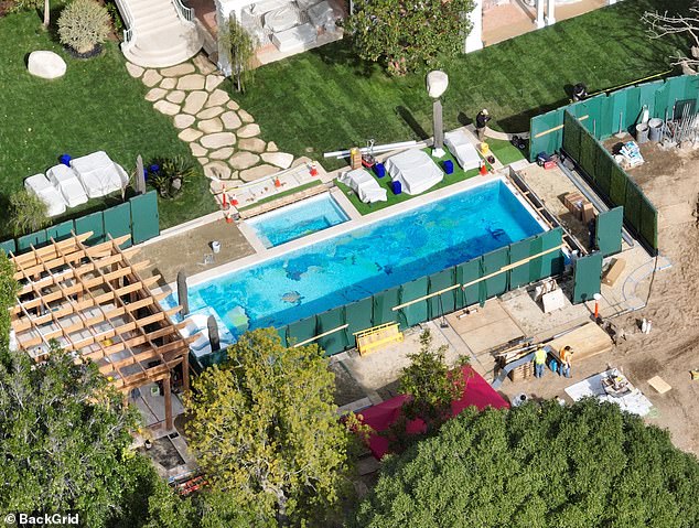 Aerial photographs also show the development of elaborately designed tropical themed pools.