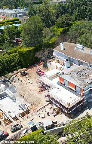 Construction on his massive estate in Beverly Hills, with men seen hard at work in May 2023