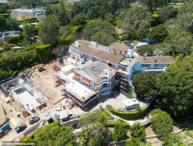 Exclusive photos from DailyMail.com show construction has resumed on Jeff Bezos' massive Beverly Hills estate in May 2023.