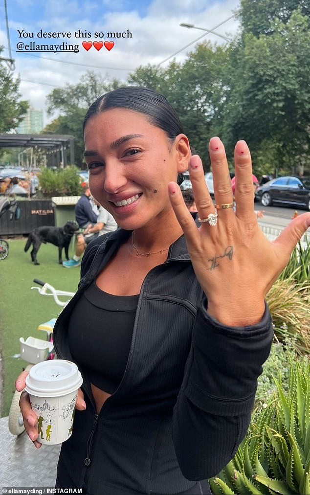 She looked completely happy as she showed off her beautiful ring after Guy popped the question.