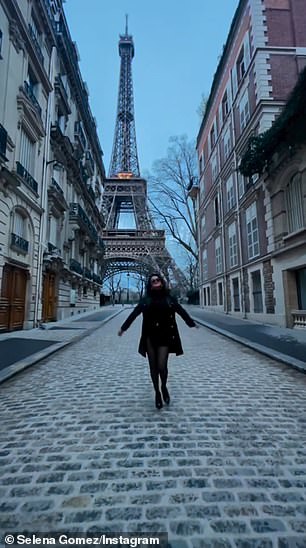 Another shot showed her dancing on an empty Paris street with the Eiffel Tower behind her.