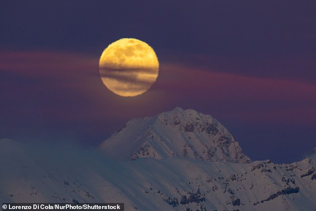 Photographed here in Italy in L'Aquila National Park, the Snow Moon gets its name from the abundance of snow in the northern hemisphere that usually accompanies its arrival.