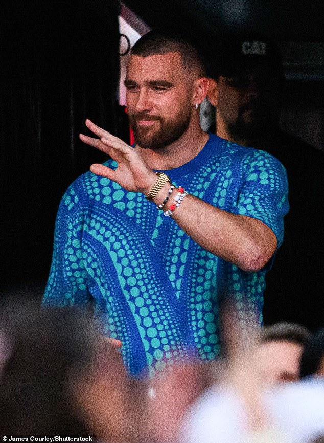 Travis Kelce has already left to fly back to Las Vegas to continue partying with his Kansas City Chiefs teammates. He is pictured attending Friday's concert.