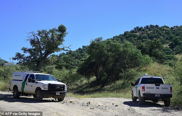 U.S. Border Patrol vehicles are seen along a highway near the U.S.-Mexico border on rancher Jim Chilton's 50,000-acre ranch southeast of Arivaca, Arizona.
