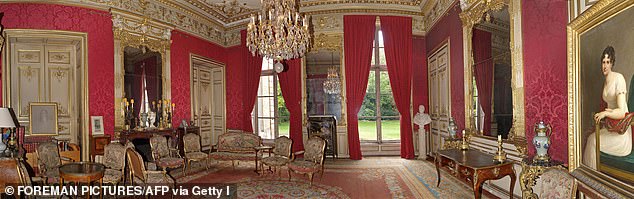Large chandeliers are found in all rooms of the private residence.